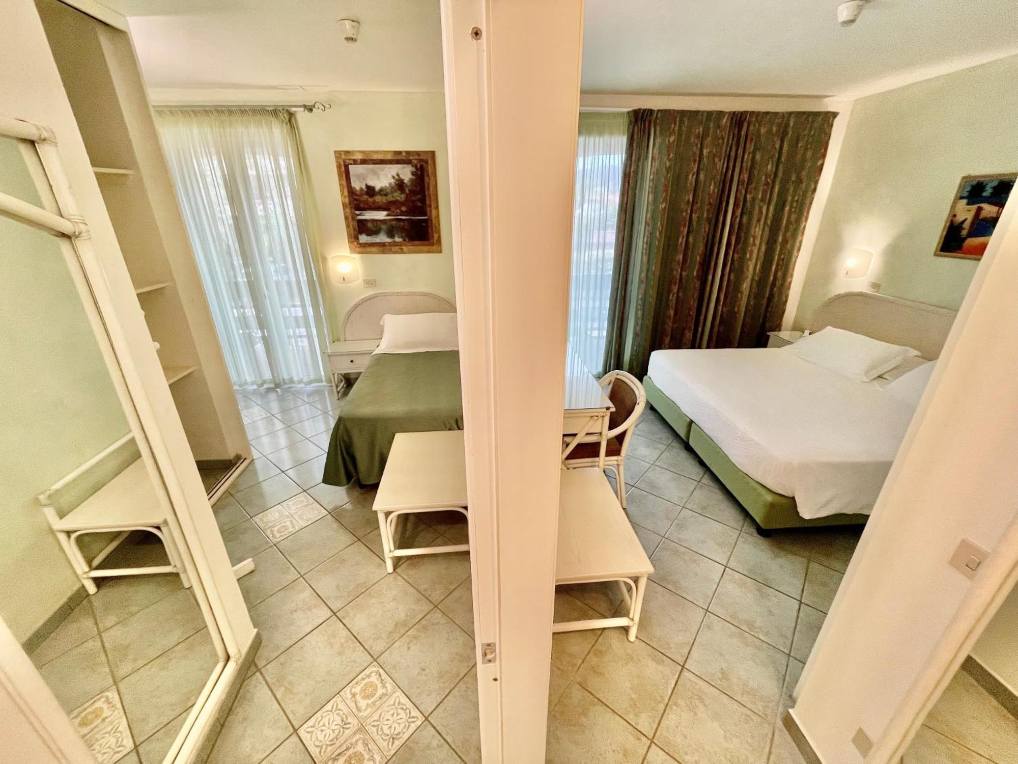 Hotel Meridiana Marina di Campo Pokoj fotografie